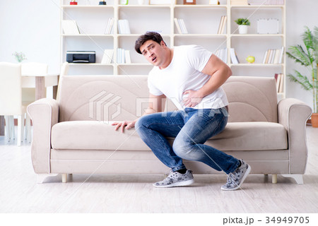 Man suffering from sick stomach and vomiting Man suffering from sick stomach and vomiting 34949705