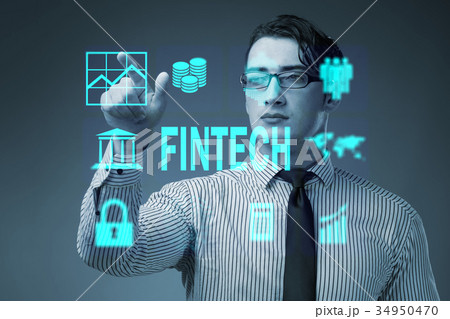 Businessman pressing buttons in fintech concept 34950470