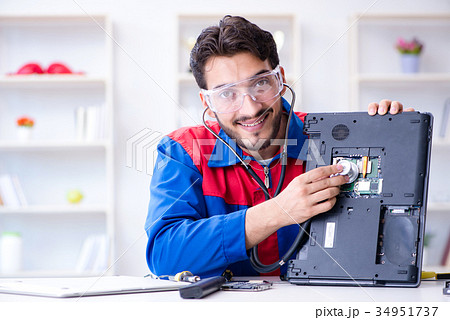 Repairman working in technical support fixing Repairman working in technical support fixing 34951737