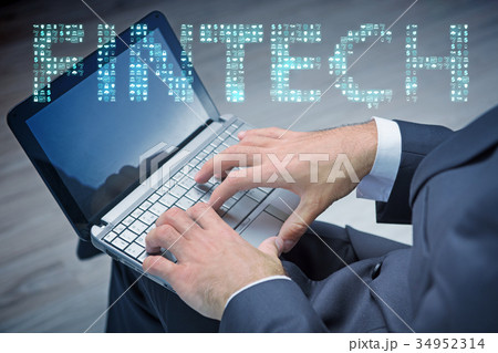 Hands working on laptop in financial technology Hands working on laptop in financial technology 34952314