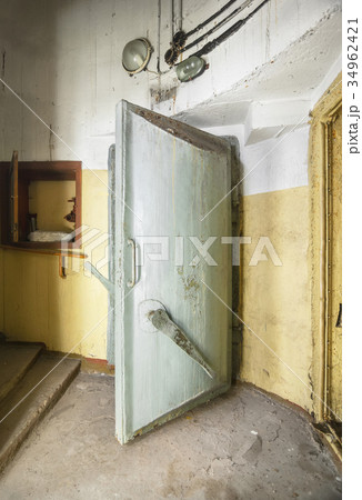 Heavy steel door in the old soviet bomb shelter 34962421