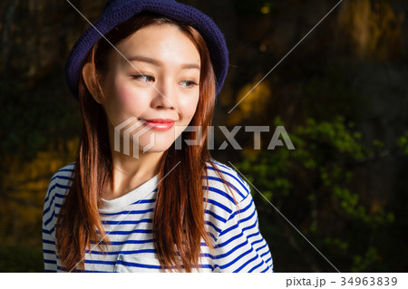 Asian woman with nature background Asian woman with nature background 34963839