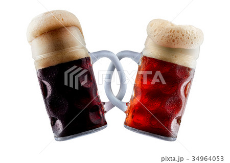 Two beer mugs making toast 34964053