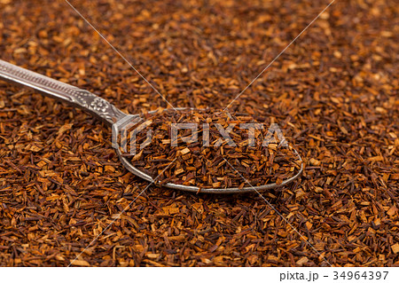 Heap of dry rooibos tea 34964397