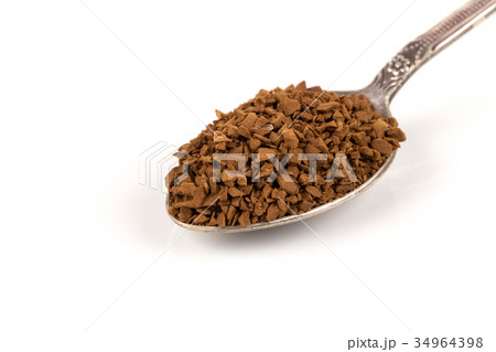 Pile of instant coffee grains 34964398