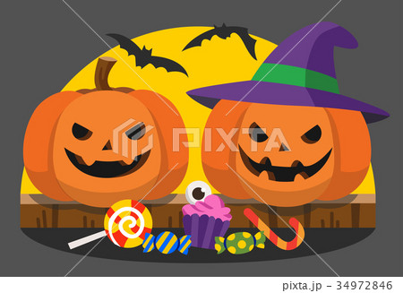 Pumpkins with candy under the moonlight. 34972846