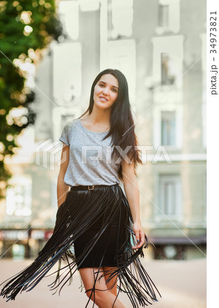 gorgeous girl walking around town 34973821