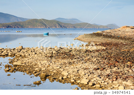 Basket boats at a lagoon on sunset in Phuoc Dong 34974541