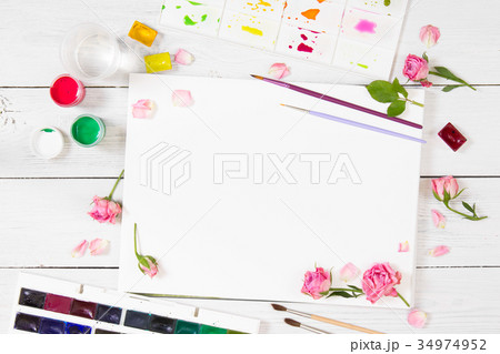 Sketchbooks, brushes watercolor paints and palette Sketchbooks, brushes watercolor paints and palette 34974952
