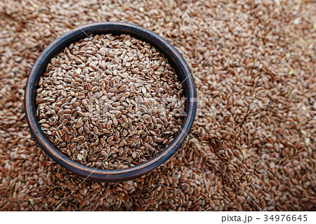 Flax seeds in a plate 34976645