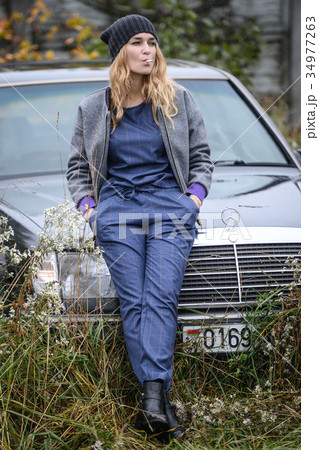 pretty young caucasian girl fashion dress outdoor 34977263