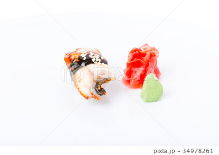 Nigiri sushi with smoked unagi and sesame. Nigiri sushi with smoked unagi and sesame. 34978261