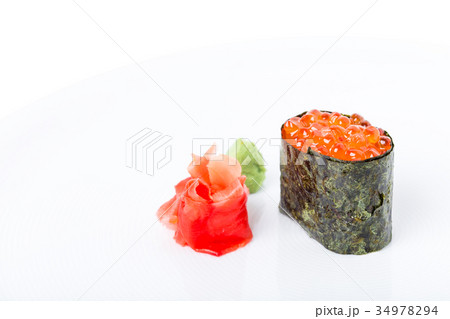 Gunkan sushi stuffed with red salmon caviar. 34978294