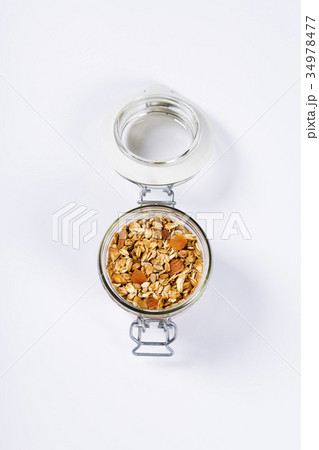 Homemade oatmeal granola with fruits and nuts Homemade oatmeal granola with fruits and nuts 34978477
