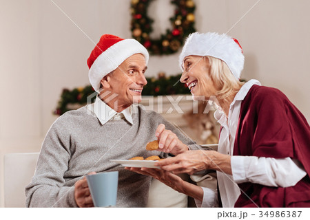 Cheerful people spending time with pleasure Cheerful people spending time with pleasure 34986387