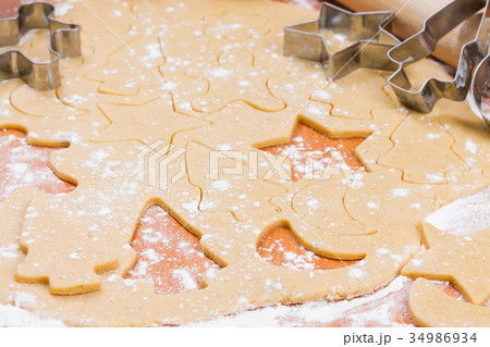 preparing the Christmas ginger cookies with molds 34986934