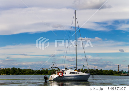 White sailing yacht on the river Dnieper 34987107