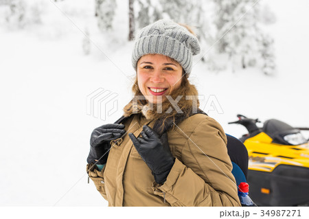 Happy girl on winter nature background. Winter Happy girl on winter nature background. Winter 34987271