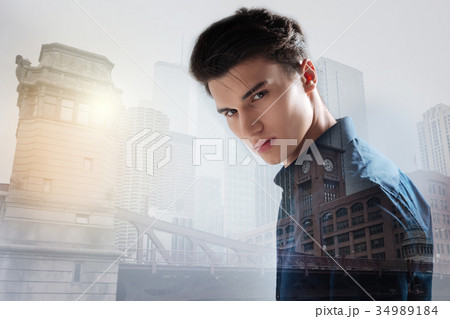 Young model expressing calmness in urban Young model expressing calmness in urban 34989184
