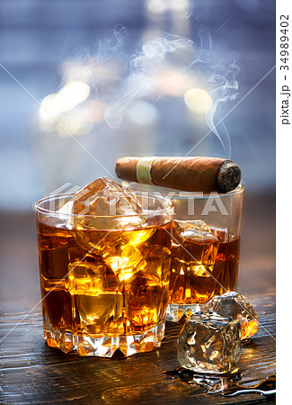 Whiskey and cigar Whiskey and cigar 34989402