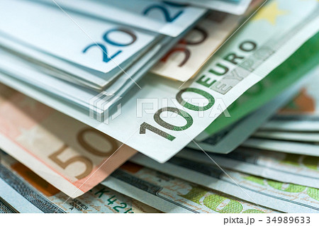 Euro and USA dollar money banknotes background 34989633