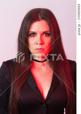 Fashion young woman going to Halloween party Fashion young woman going to Halloween party 34989889