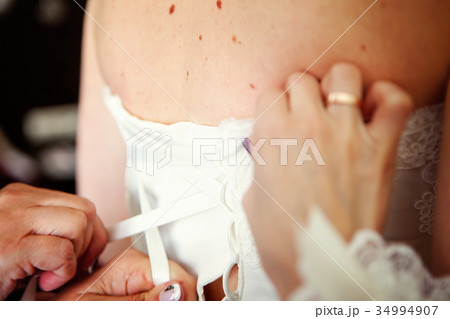Lacing on a wedding dress Lacing on a wedding dress 34994907