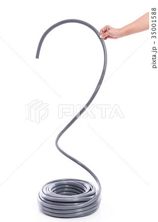 curled garden hose isolated on white 35001588