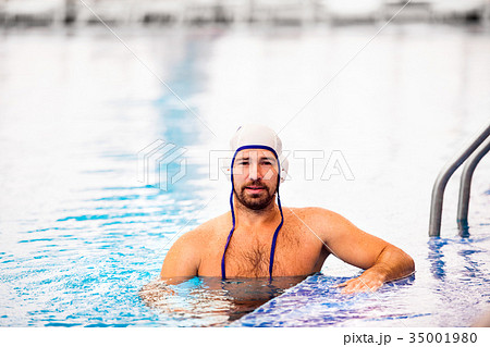 Water polo player in a swimming pool. 35001980