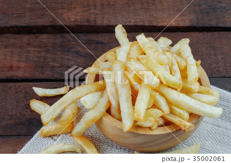 French fries on tablecloth. 35002061