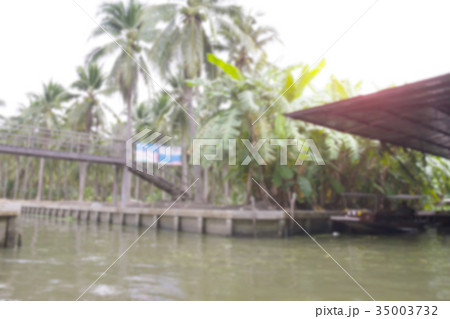 Canal in countryside blur background Canal in countryside blur background 35003732