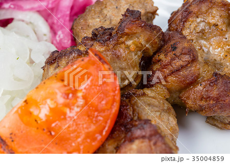 Pork barbecue with grilled vegetables 35004859