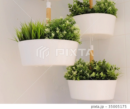 Green Artificial Plants in A Metal Pot 35005175