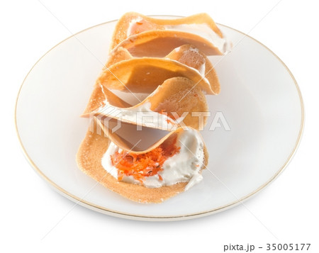 Thai Crispy Crepes with Sweet Cream Thai Crispy Crepes with Sweet Cream 35005177