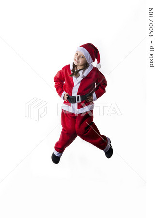 Little caucasian girl dressed as Santa Claus 35007309