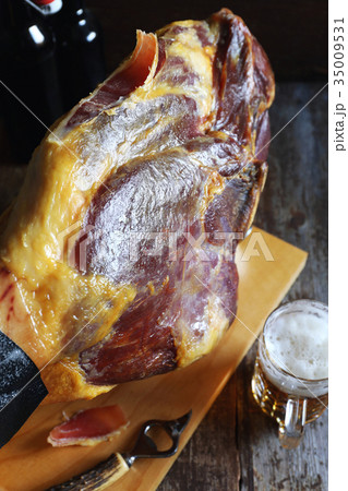 Traditional Spanish jamon. Pork leg ham and beer 35009531