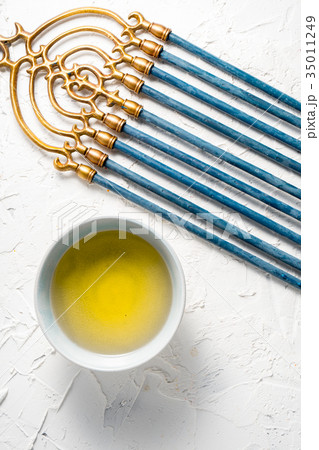 Menorah brass Hanukkah with blue candles and Menorah brass Hanukkah with blue candles and 35011249