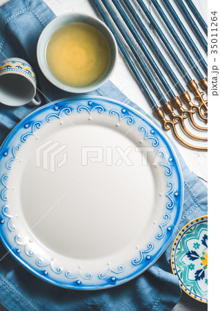 Large plate and olive oil in a bowl, Hanukkah on a Large plate and olive oil in a bowl, Hanukkah on a 35011264