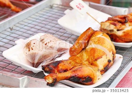 Grilled chicken at the market Grilled chicken at the market 35013425
