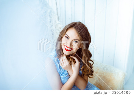 woman on a swing in the Studio 35014509