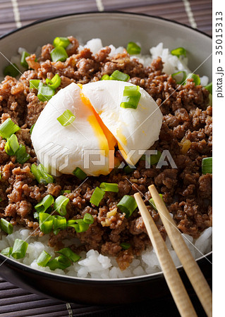 Beef Soboro with egg poached, rice and green onion 35015313