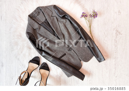 Gray jacket with a leather sleeve, black shoes Gray jacket with a leather sleeve, black shoes 35016885