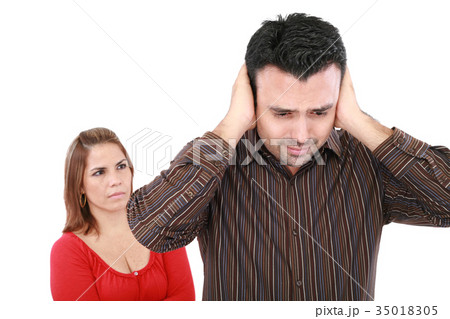 Couple having an argument. Focus on man Couple having an argument. Focus on man 35018305