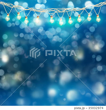 Christmas lights garland with glowing on blue 35032974