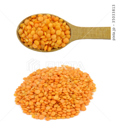Lentils in spoon isolated  35033813