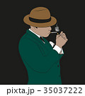 A man in a hat smokes a cigarette 35037222
