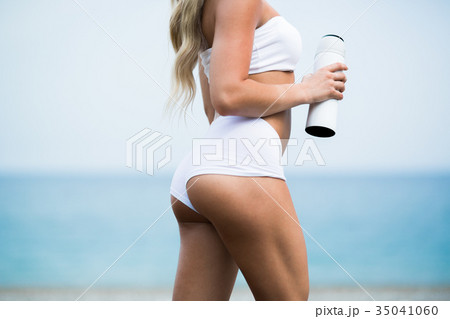 Beautiful young woman with long blond hair in 35041060