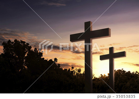 Christian cross in the field with trees 35053835
