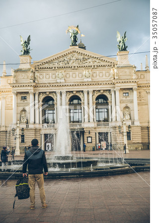 man walking by old european city man walking by old european city 35057087