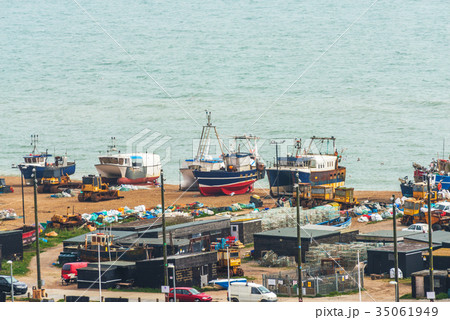 Fishing boats on the shore, pebble beach 35061949